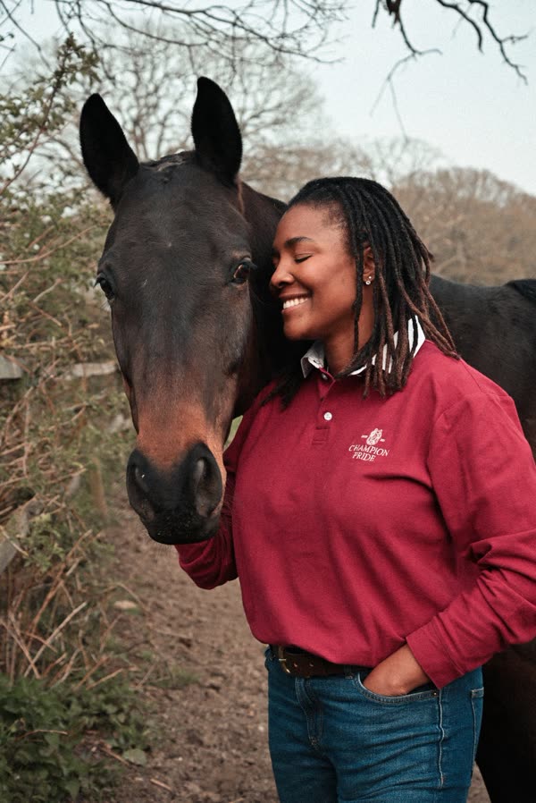 A Champion Pride handler with a horse