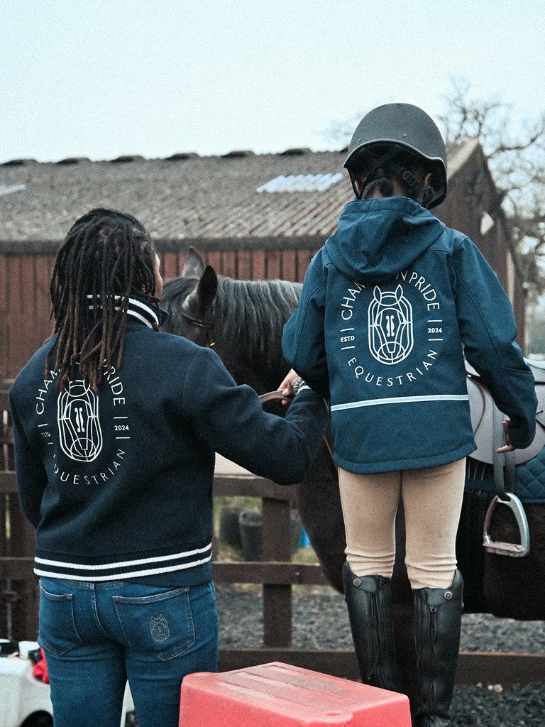 Champion Pride handler beside a horse
